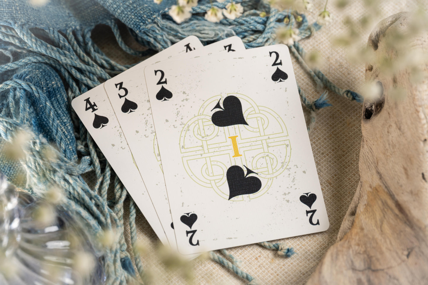 Number cards with decorative elements on a textured surface