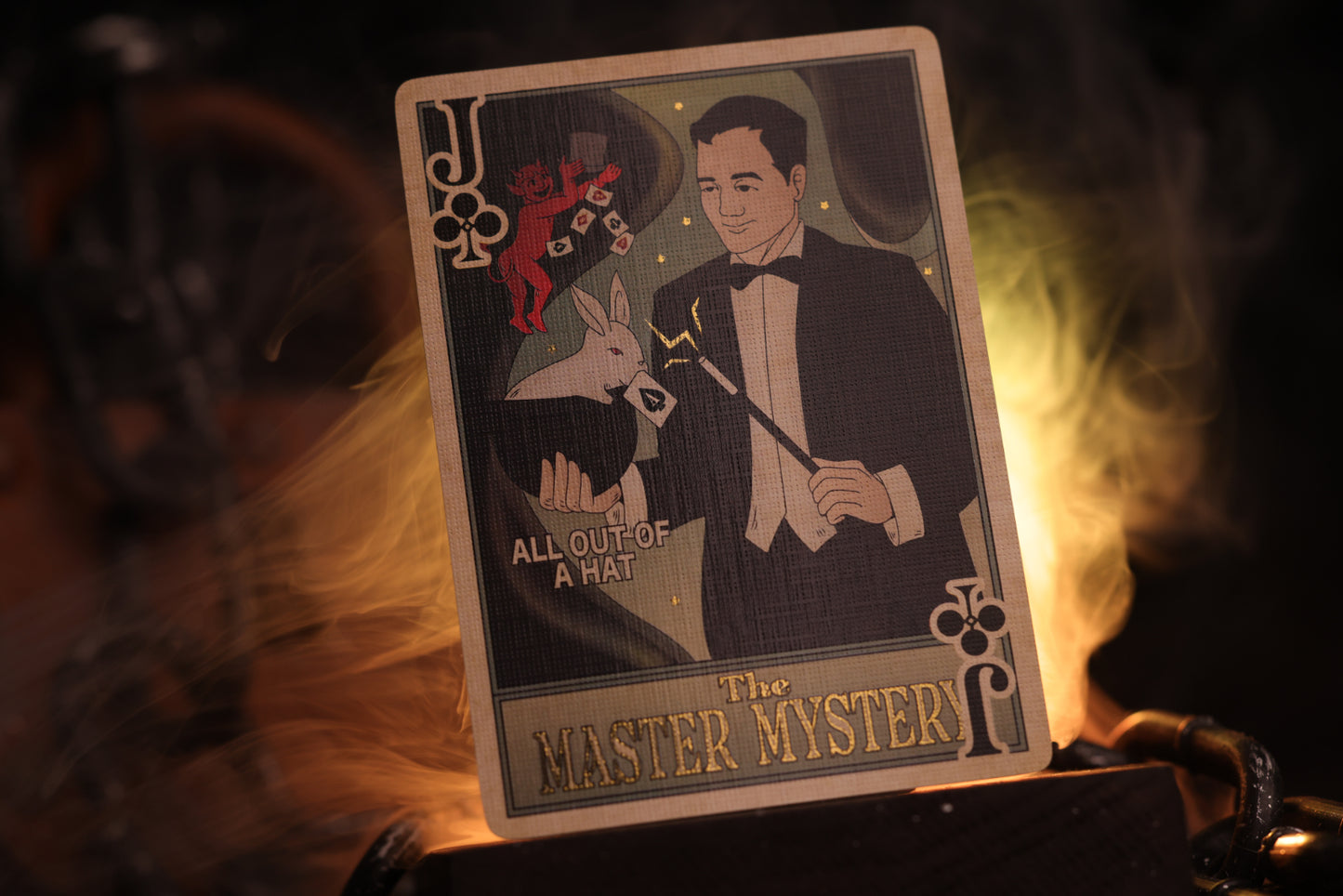 Court card with a magician and rabbit illustration, labeled 'The Master Mystery', on a dark background.