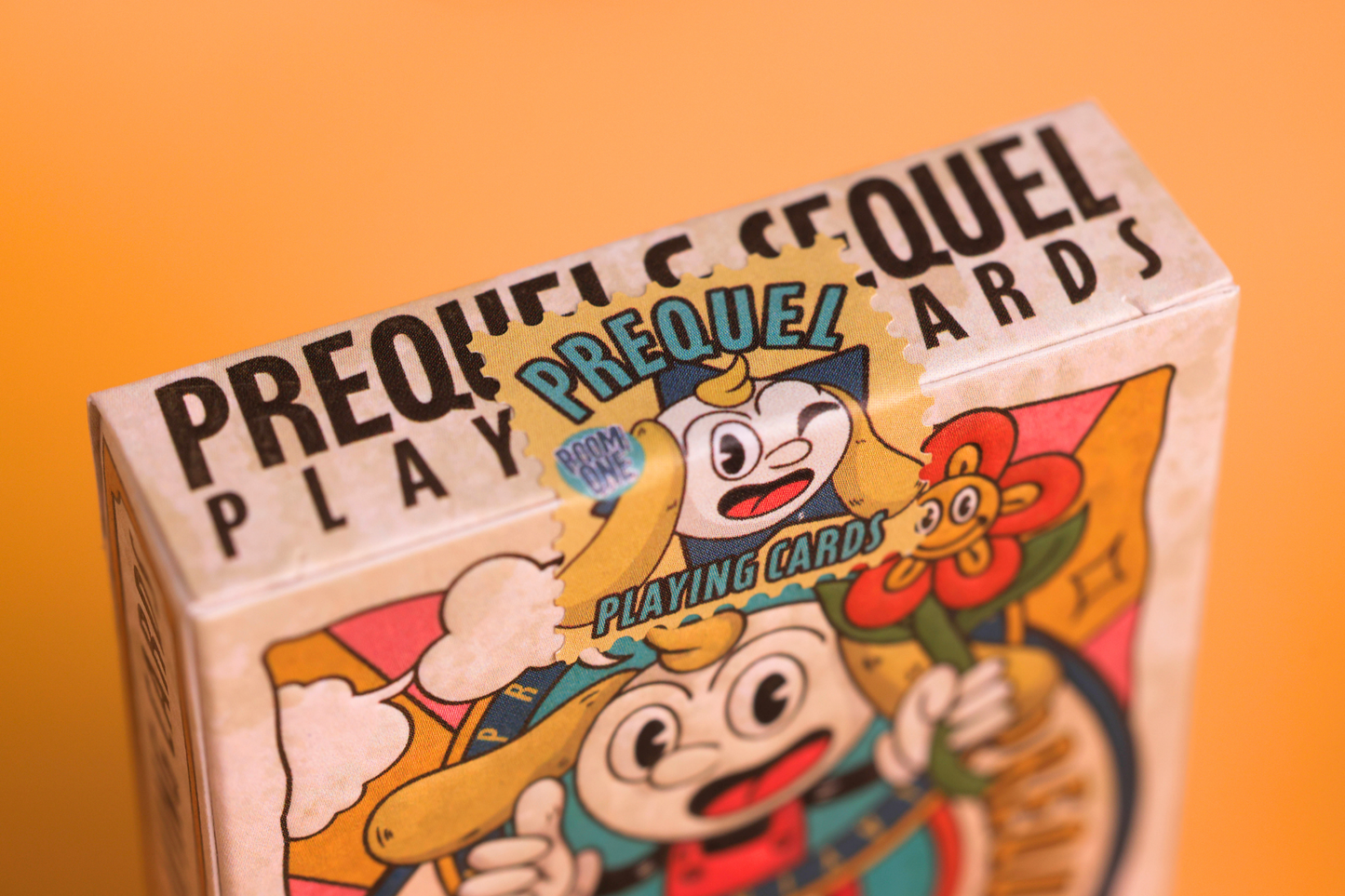 Box of Prequel Playing Cards with cartoon characters on an orange background