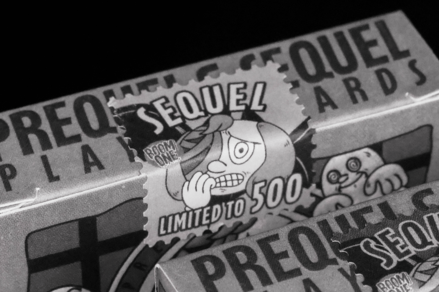 Close-up of a Sequel Gilded Edition Tuck Box Seal