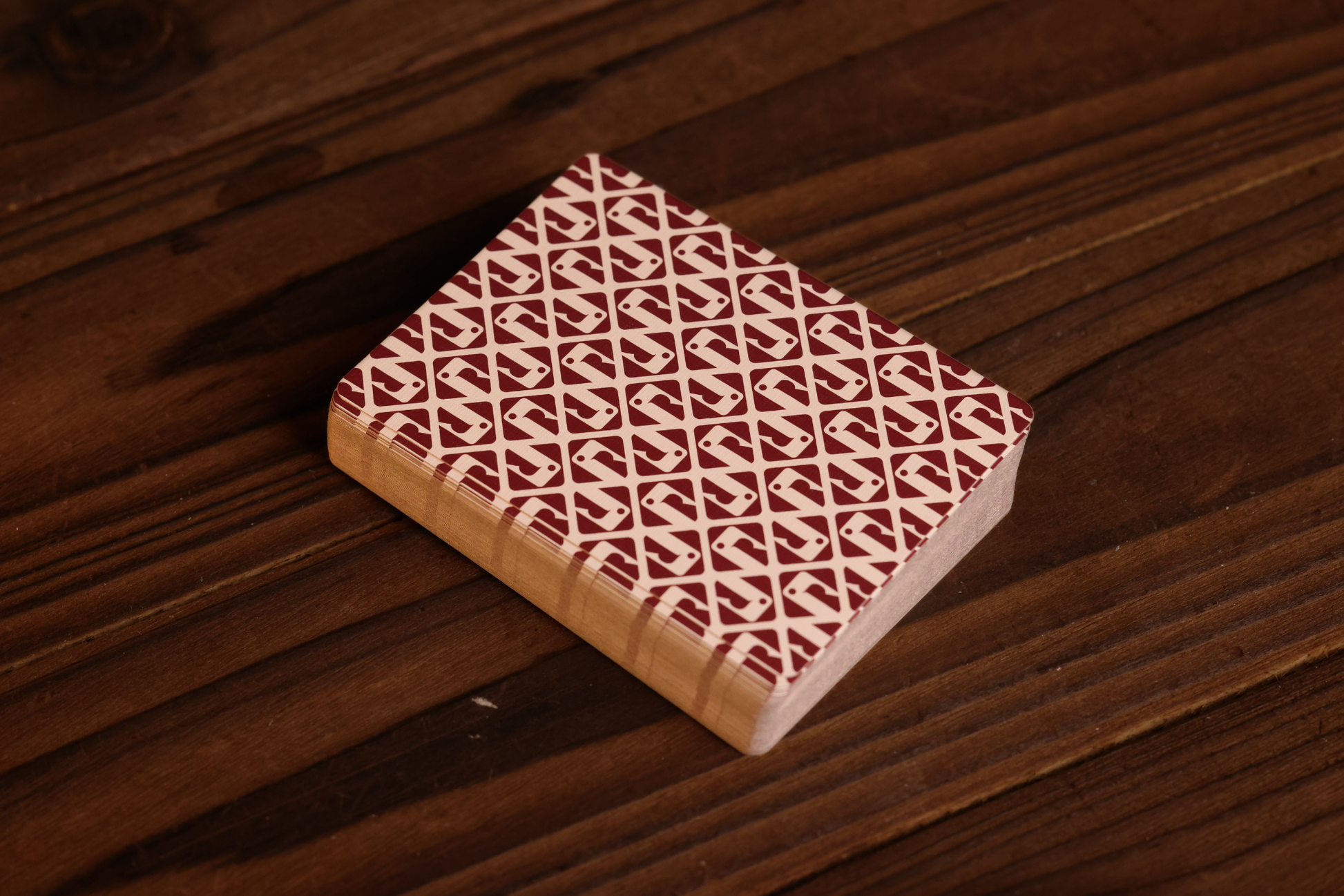 Burgundy Pine on a wooden surface