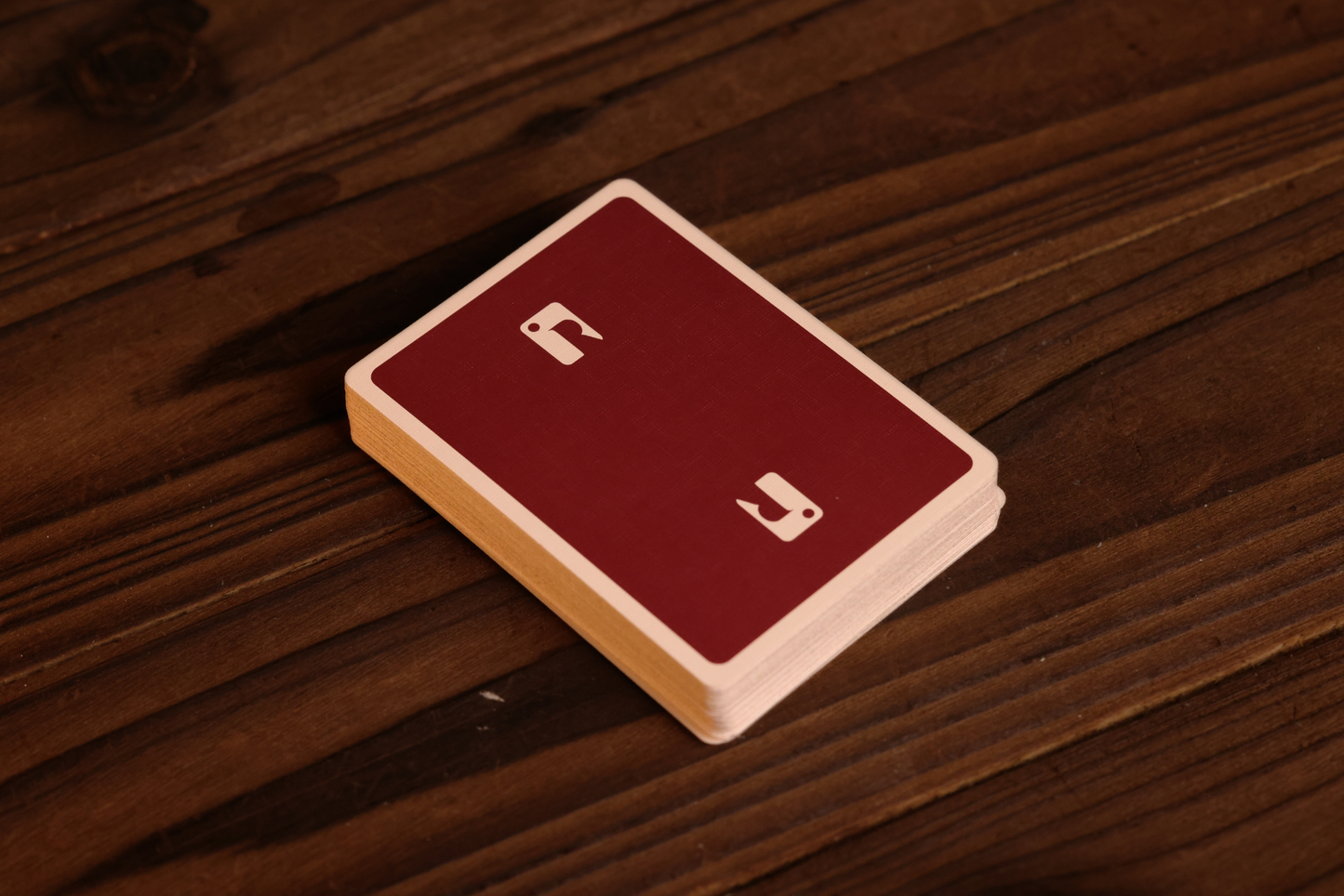 Burgundy Teak on a wooden surface