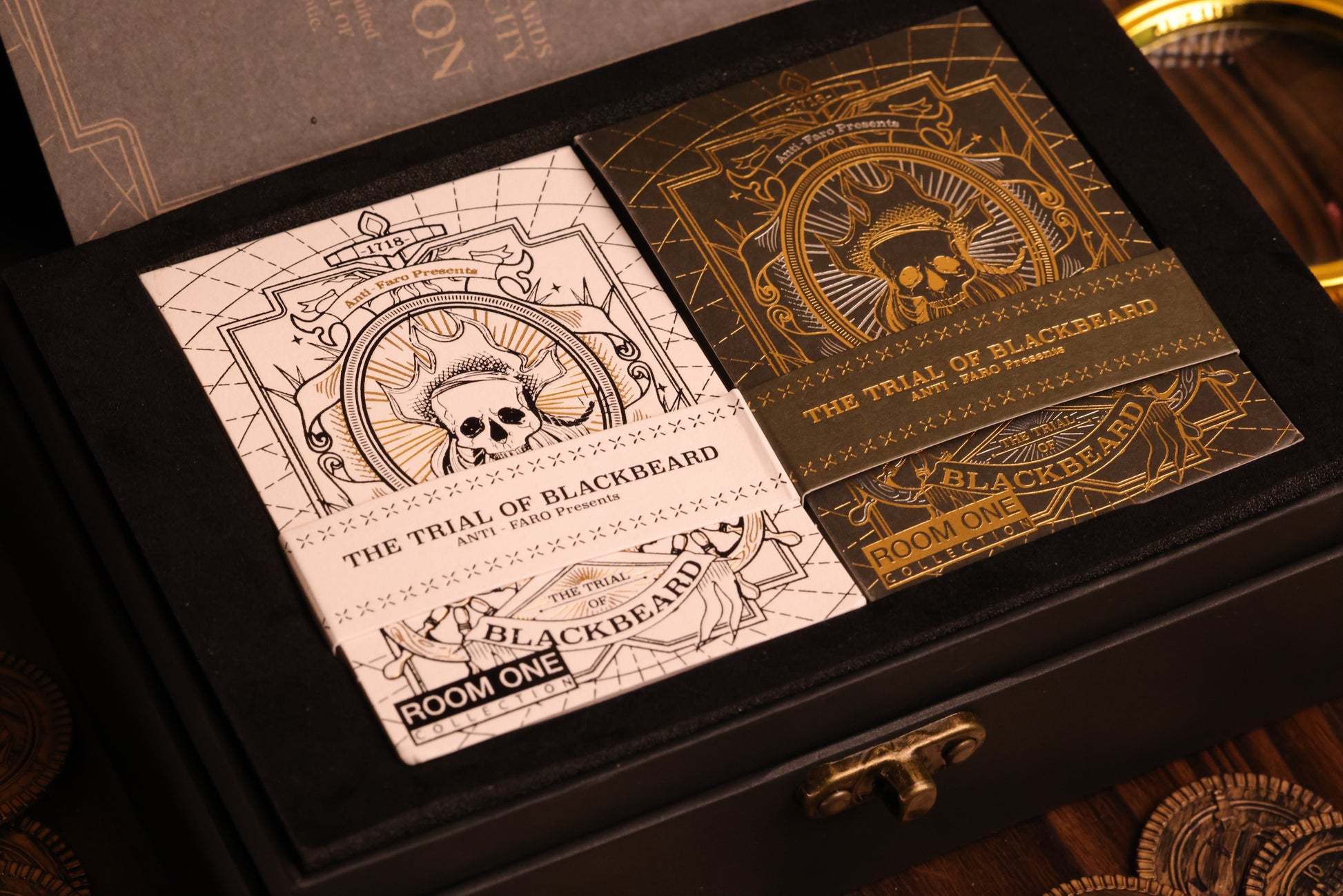 Playing cards with 'The Trial of Blackbeard' design in a black box.