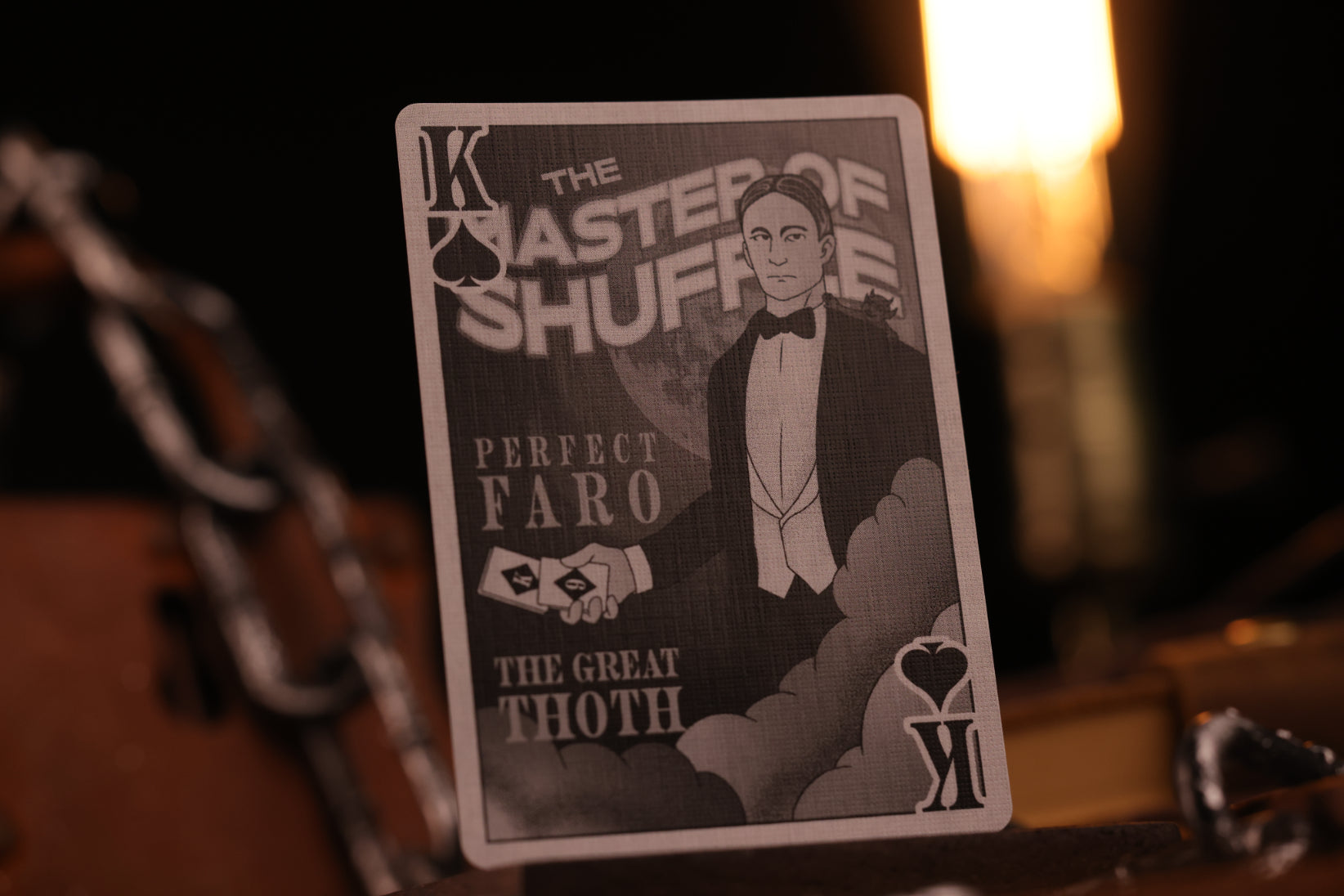 Playing card with a magician and text on a dark background