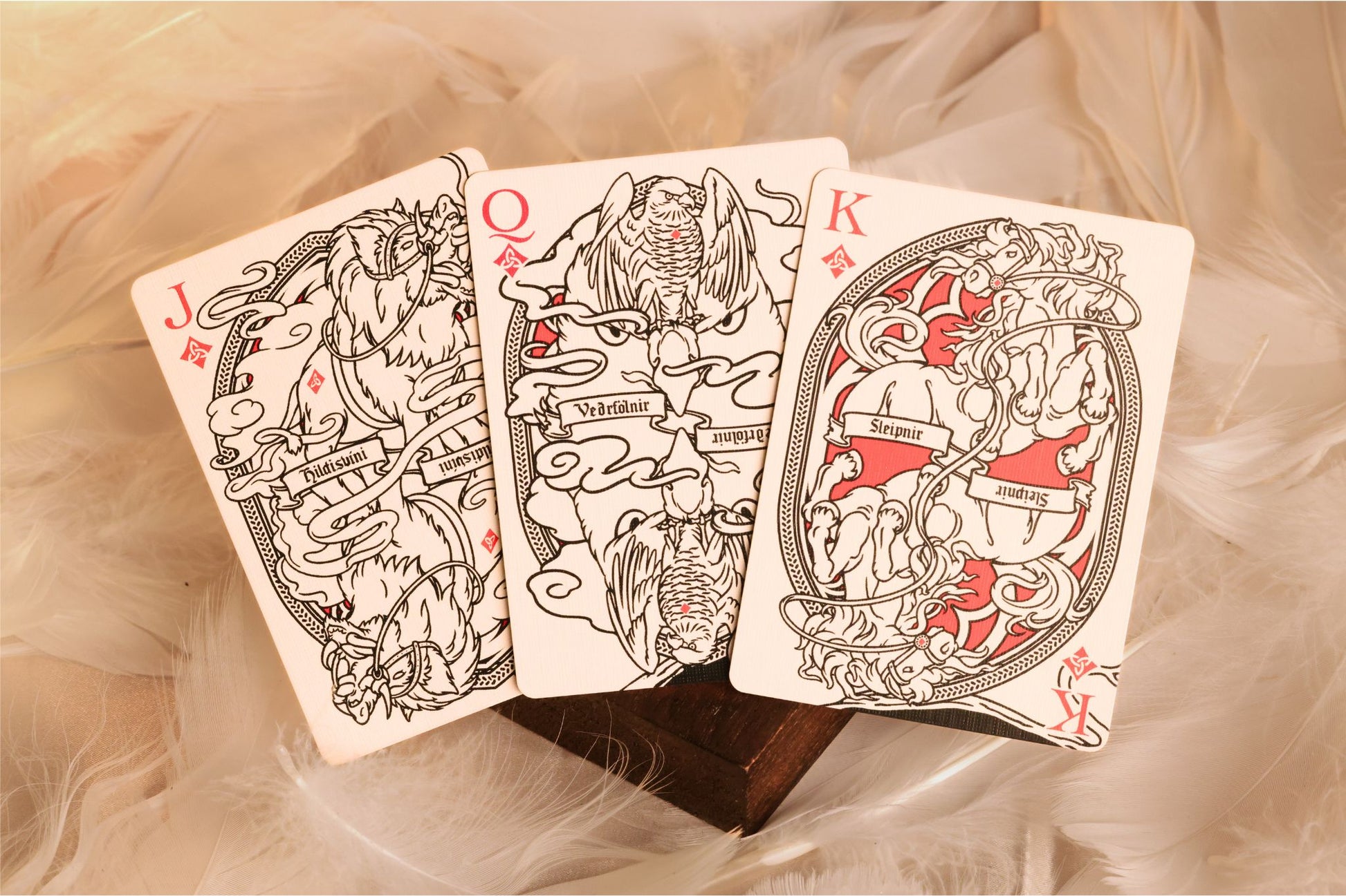 MYTHIC edition Fury of Light Court Cards with illustrations of gods and goddesses on a bed of feathers.