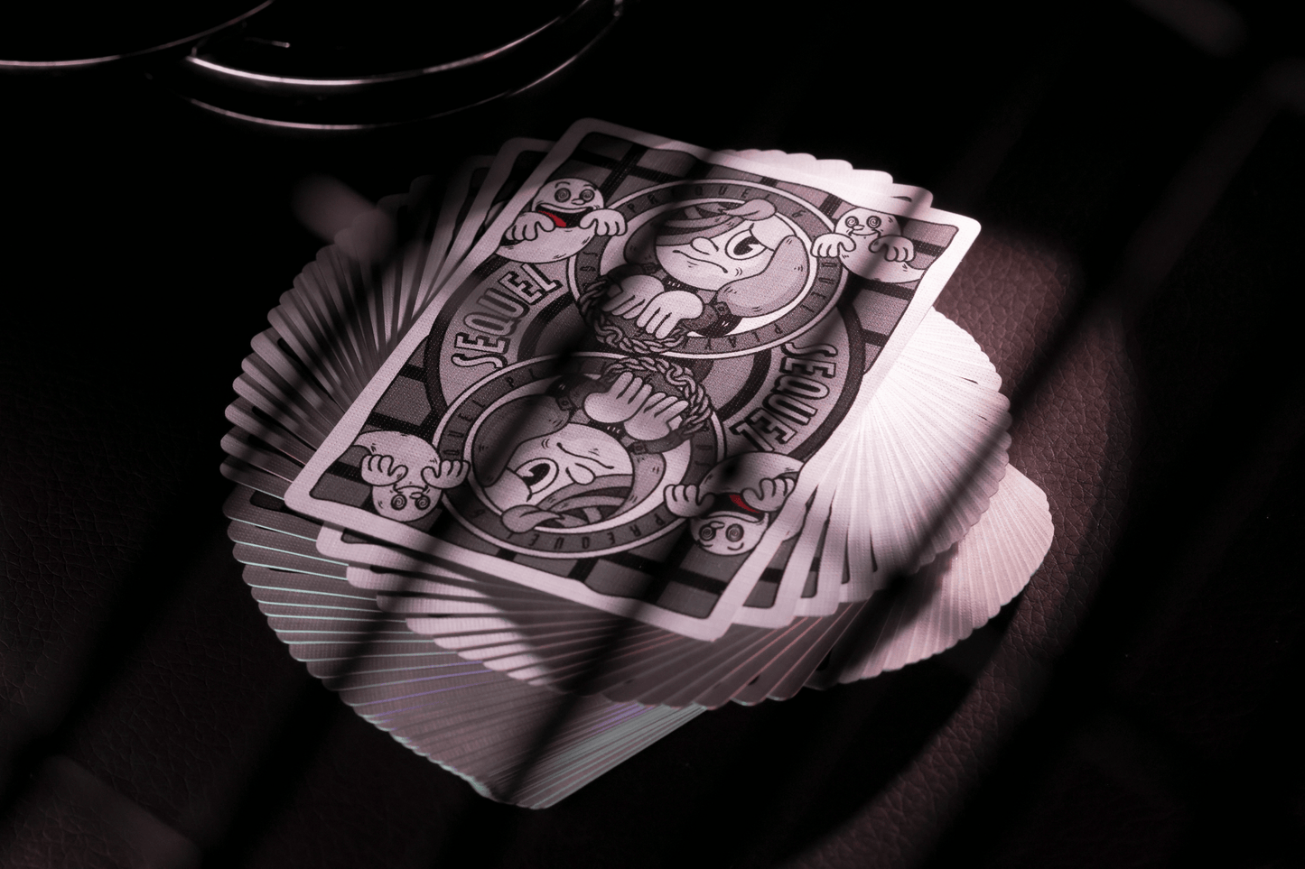 Sequel Playing cards with a unique design on a dark background