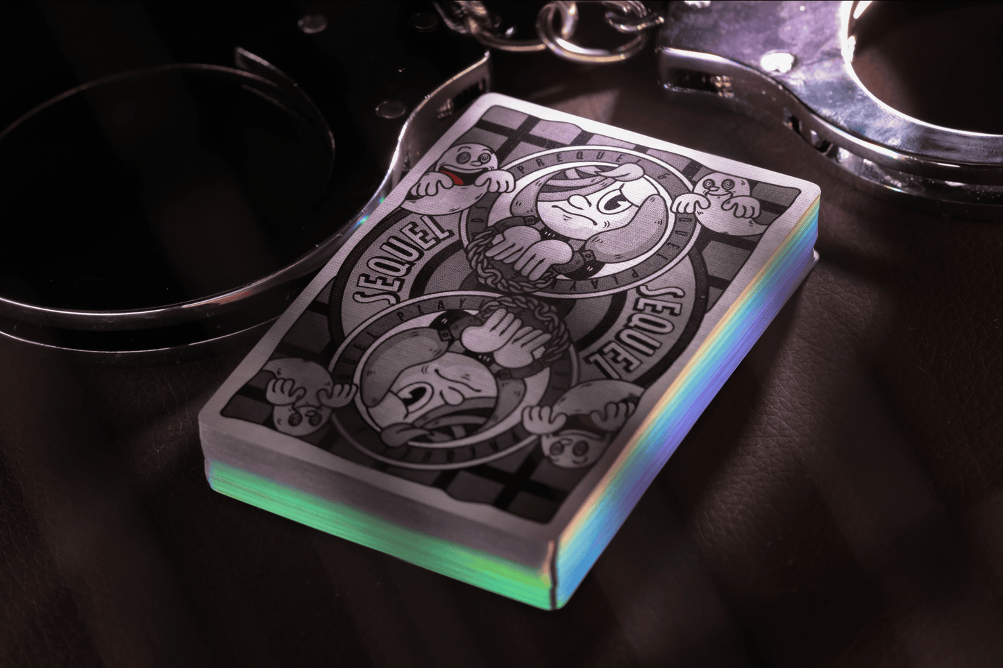 Sequel Gilded Edition Playing cards with a unique design on a dark surface