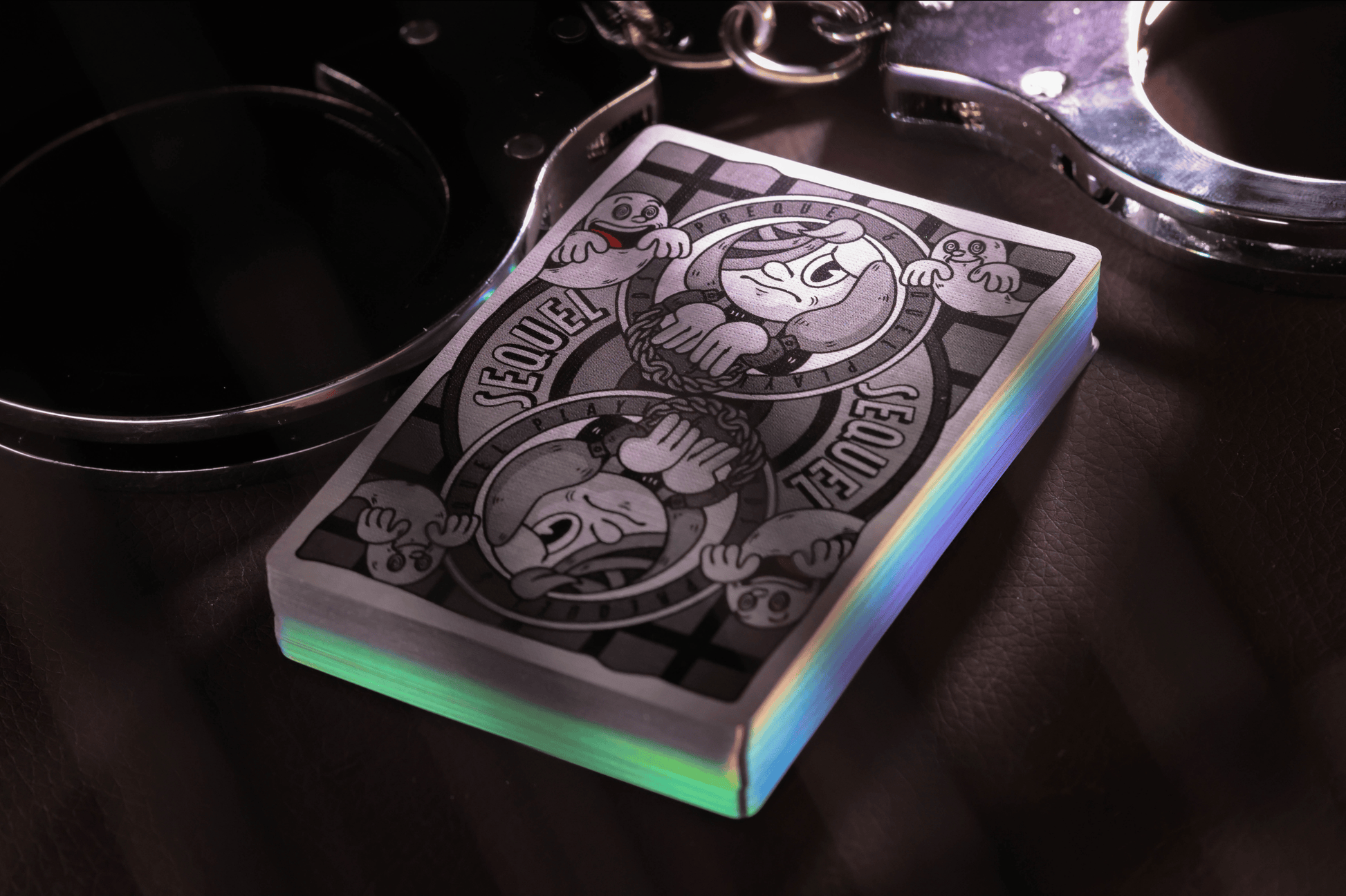 Sequel Gilded Edition Playing cards with a unique design on a dark surface